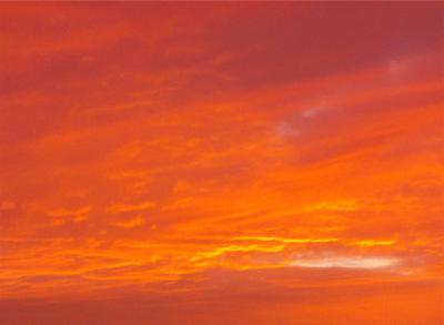 Orangerosaner Himmel bei Sonnenuntergang