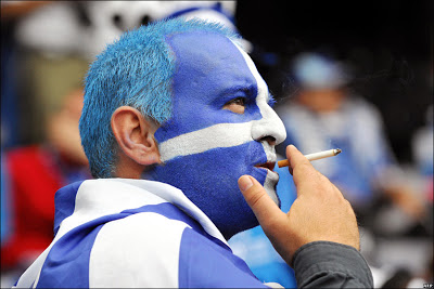 1-_45993675_greekfan_afp