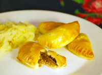 Piroschki mit Pilz-Fleischfüllung und Champagnerweißkraut