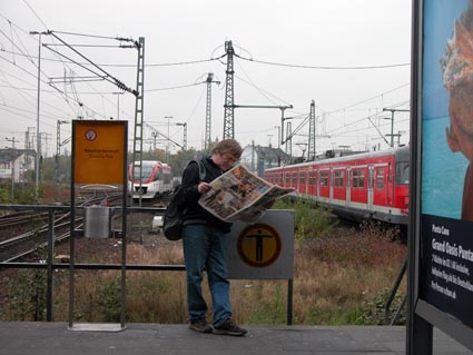 Pendler-mit-Zeitung