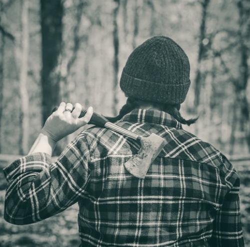 pig-tailed-camper-holding-hatchet-01