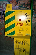 an sos-telephone on a dark street in triest, italy an sos-telephone on a dark street in triest, italy
