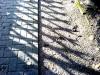 Schatten der Jaegerzaunlatten